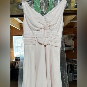 Blush pink bridesmaid dress.